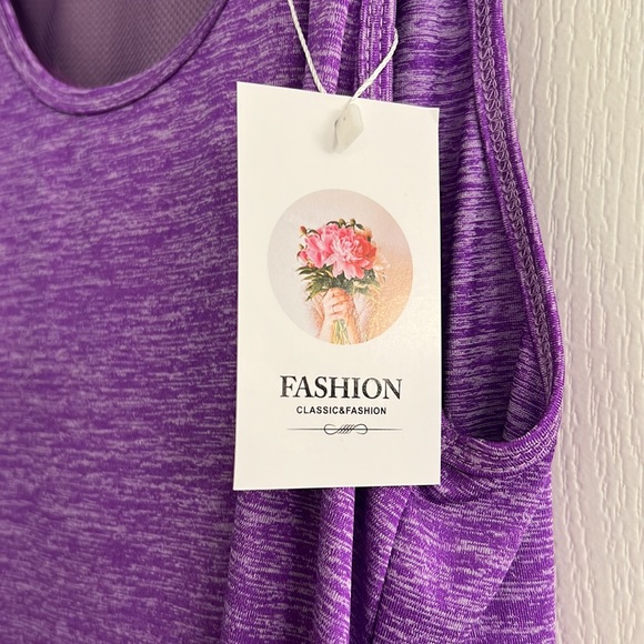 Purple workout top. Split back. New with tags. Small. - Picture 2 of 3